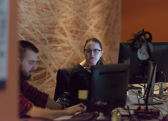 Image showing designers in the night startup office