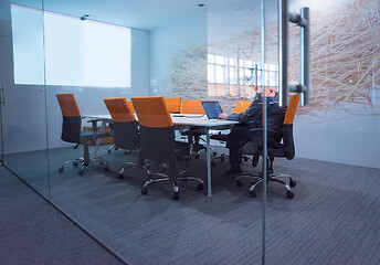 Image showing businessman working using a laptop in startup office