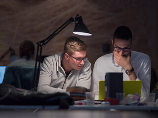 Image showing designers in the night startup office