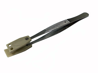 Image showing Small metal tweezers.