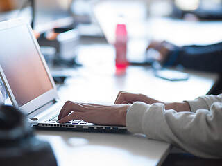 Image showing businessman working using a laptop in startup office