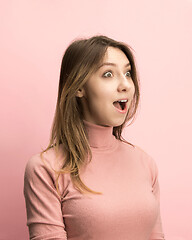 Image showing The woman screaming with open mouth isolated on pink background, concept face emotion