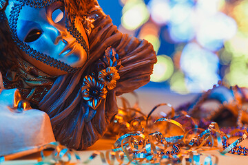 Image showing Traditional female carnival venetian mask on bokeh background. Masquerade, Venice, Mardi Gras, Brazil concept