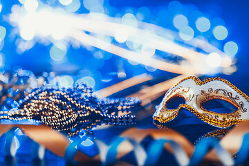 Image showing Traditional female carnival venetian mask on bokeh background. Masquerade, Venice, Mardi Gras, Brazil concept