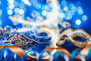 Image showing Traditional female carnival venetian mask on bokeh background. Masquerade, Venice, Mardi Gras, Brazil concept