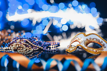 Image showing Traditional female carnival venetian mask on bokeh background. Masquerade, Venice, Mardi Gras, Brazil concept