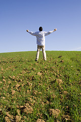 Image showing outstretched to the blue sky