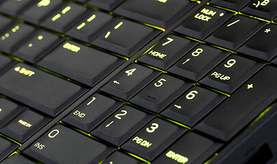 Image showing Close up led backlit computer laptop keyboard