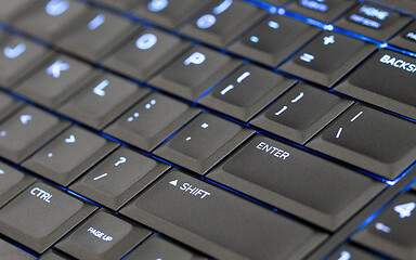 Image showing Close up led backlit computer laptop keyboard