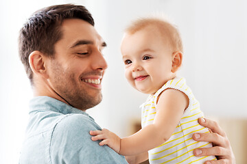 Image showing father with little baby daughter at home