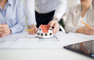 Image showing close up of architects discussing house project