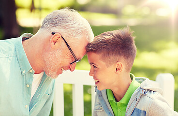 Image showing grandfather and grandson at summer park