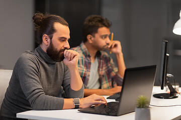 Image showing creative team with computer working late at office