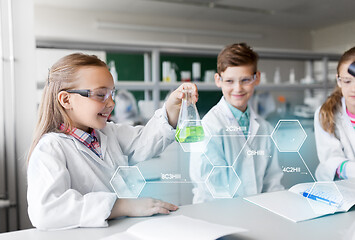 Image showing kids with test tubes studying chemistry at school