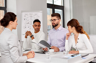 Image showing recruiters having job interview with employee