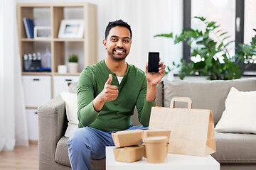 Image showing indian man using smartphone for food delivery