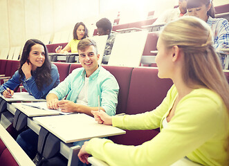 Image showing group of students with notebooks at lecture hall