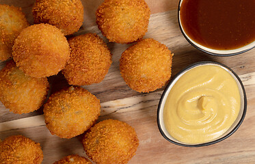 Image showing Dutch traditional snack bitterbal on a serving board