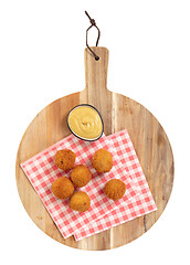 Image showing Dutch traditional snack bitterbal on a serving board