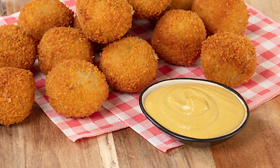 Image showing Dutch traditional snack bitterbal on a serving board