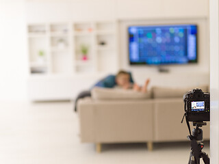 Image showing little boy playing games on smartphone