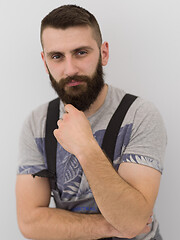 Image showing portrait of bearded hipster handyman isolated on white