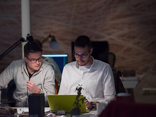 Image showing designers in the night startup office