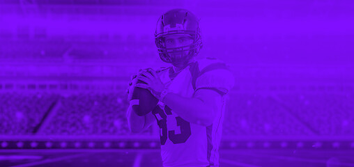 Image showing duo toned american football player in  arena at night