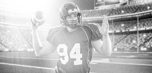 Image showing american football player throwing ball