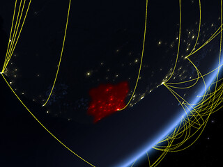 Image showing Ivory Coast on dark Earth with network