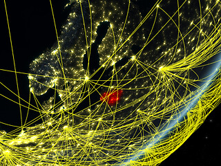 Image showing Lithuania on dark Earth with network