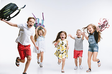 Image showing Happiness group of cute and adorable students are back to school