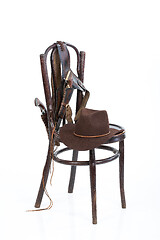 Image showing Old Chair And Cowboy Belt