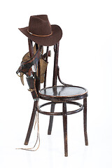 Image showing Old Chair And Cowboy Belt