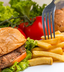 Image showing Chips With Burger Means Ready To Eat And Bun  