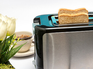 Image showing Bread In Toaster Represents Meal Time And Break 