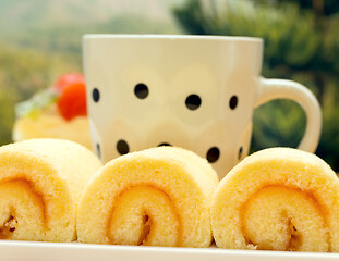 Image showing Coffee Swiss Roll Indicates Orange Flavored Cake And Break 