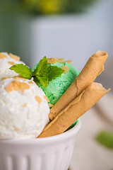 Image showing Vanilla and mint ice cream in cup