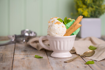 Image showing Vanilla and mint ice cream in cup