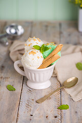 Image showing Vanilla and mint ice cream in cup