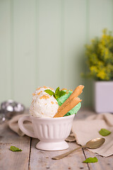 Image showing Vanilla and mint ice cream in cup