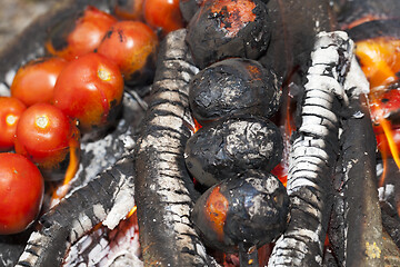 Image showing fried vegetables on a fire