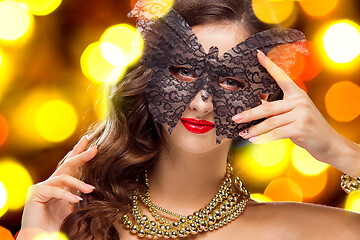 Image showing Beauty model woman wearing venetian masquerade carnival mask at party