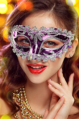 Image showing Beauty model woman wearing venetian masquerade carnival mask at party
