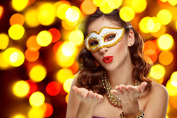 Image showing Beauty model woman wearing venetian masquerade carnival mask at party