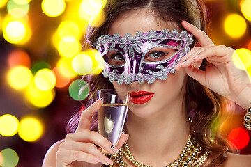 Image showing Beauty model woman wearing venetian masquerade carnival mask at party