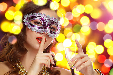 Image showing Beauty model woman wearing venetian masquerade carnival mask at party