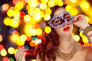 Image showing Beauty model woman wearing venetian masquerade carnival mask at party