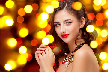 Image showing Beautiful girl and shiny background with lights