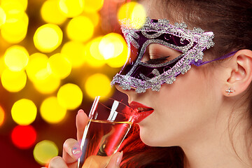 Image showing Beauty model woman wearing venetian masquerade carnival mask at party